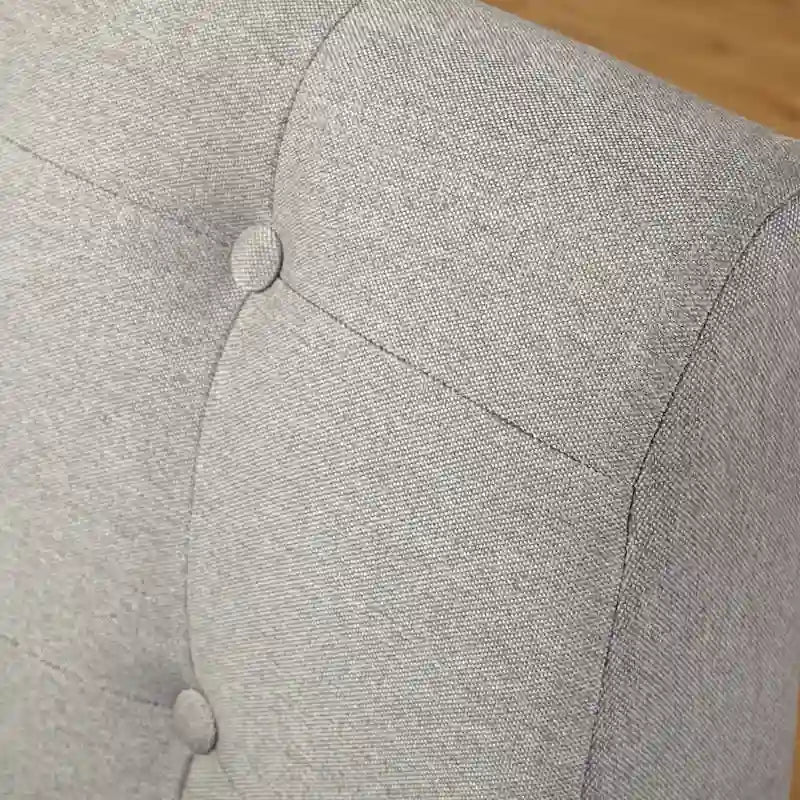 Gepolsterter armloser Akzentstuhl mit Beinen aus Gummibaumholz